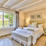 Main Ground Floor Bedroom with Queen bed and garden views